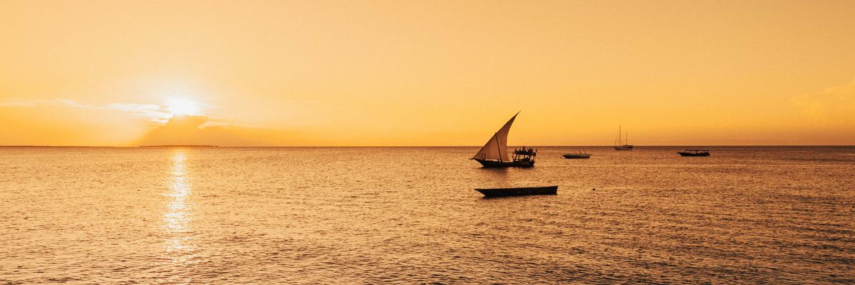 dhow boat sunset sailing